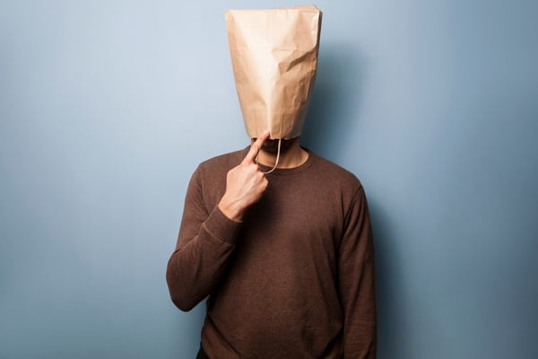 Man with bag over head